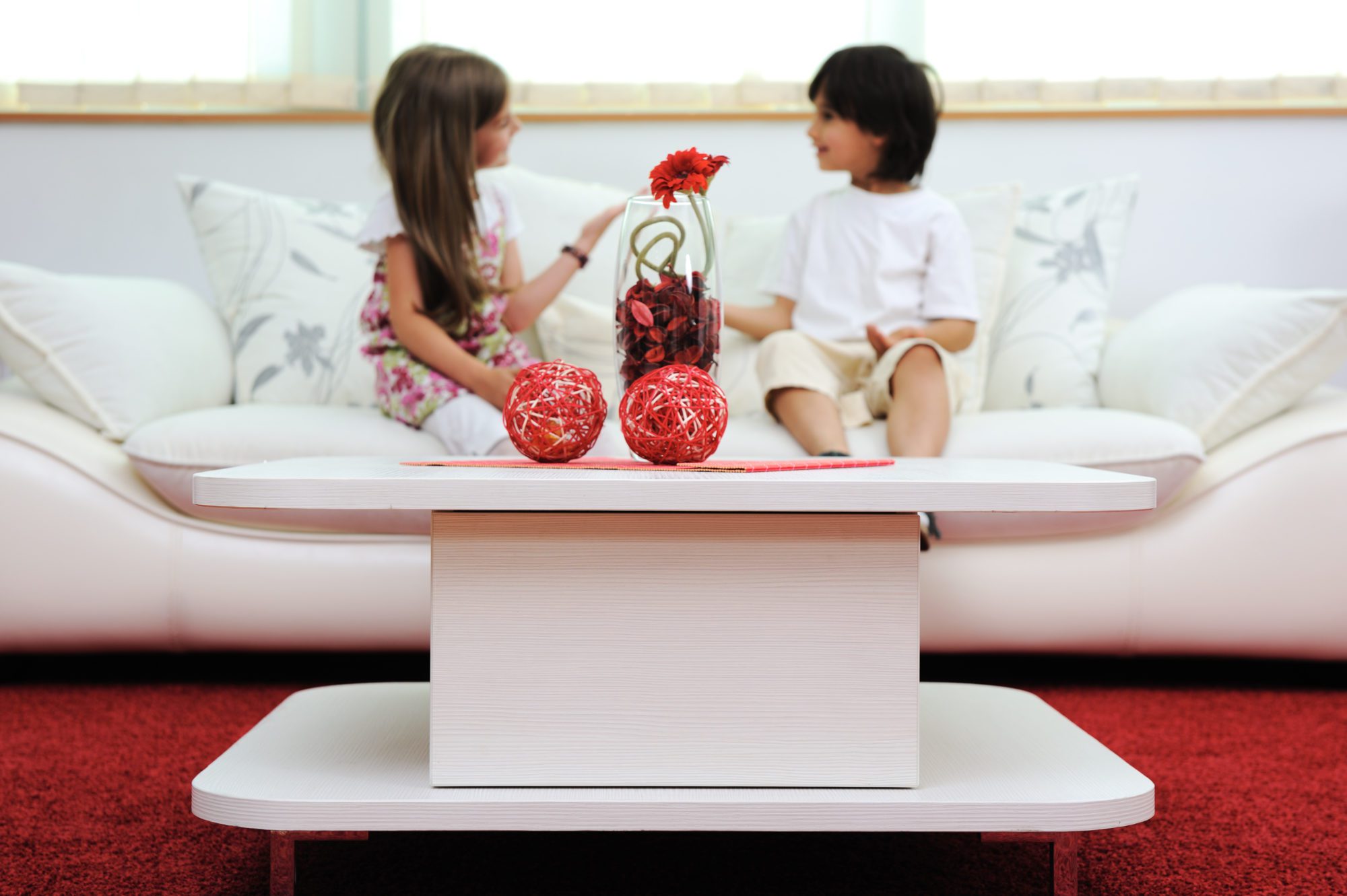 Children at new home with modern furniture