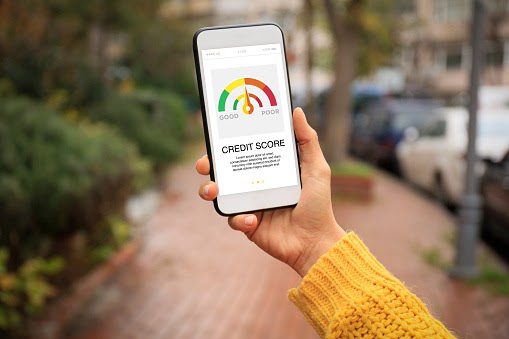 Smart Phone Showing Credit Score On A Screen Smart Phone Showing Credit Score On A Screen
