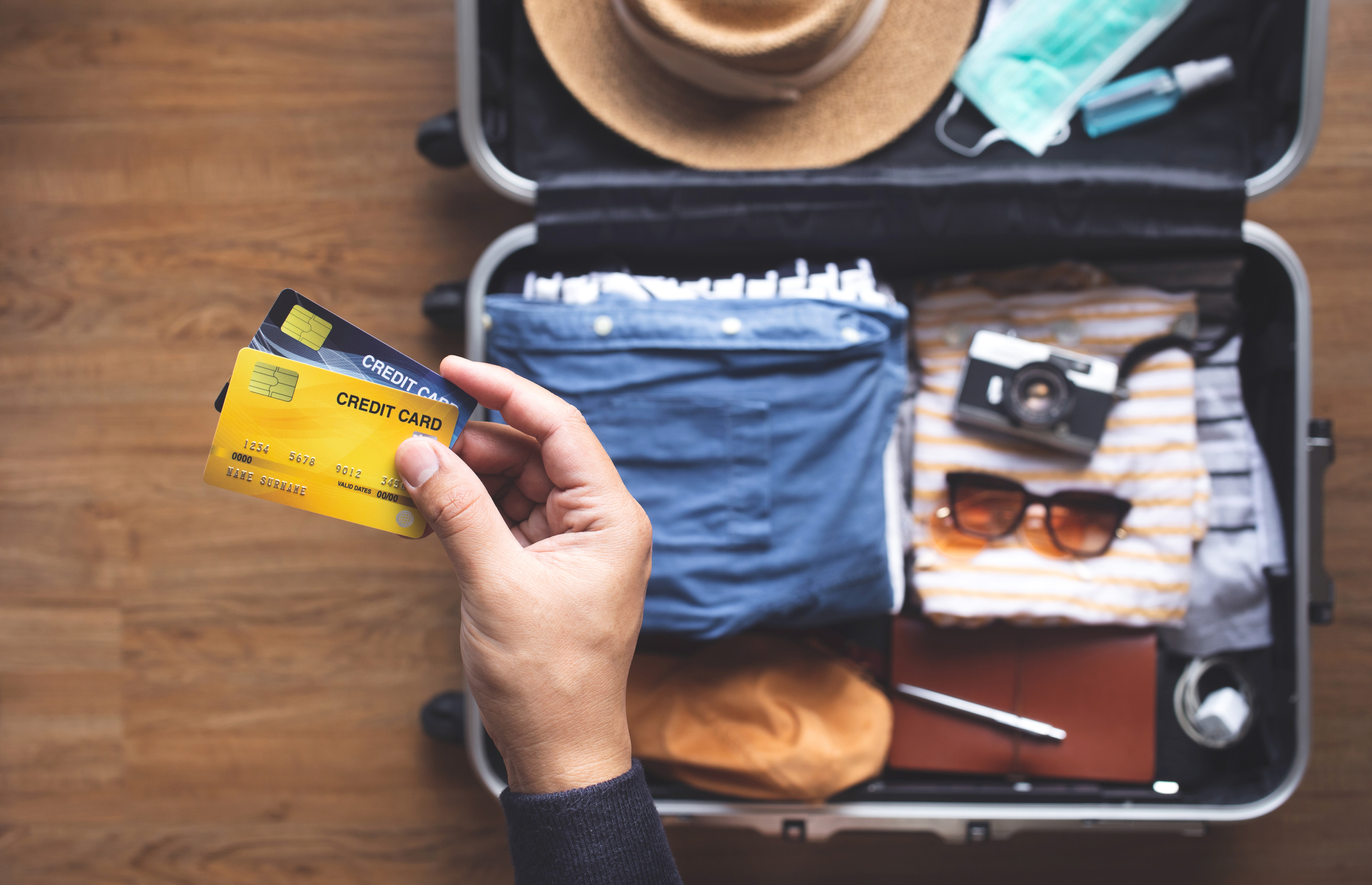 Young person using credit cards for payment on vacation or holiday trip.convenient lifestyle with technology. Young person using credit cards for payment on vacation or holiday trip.convenient lifestyle with technology.